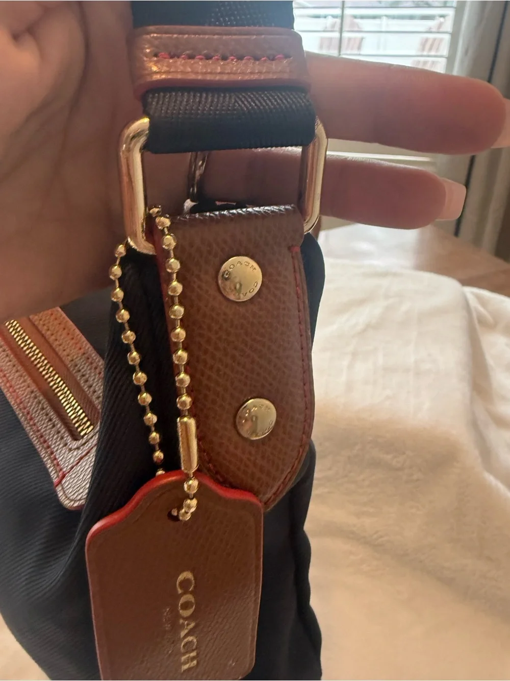 COACH Sawyer Navy Nylon Crossbody Bag with Tan leather Trim and red accents